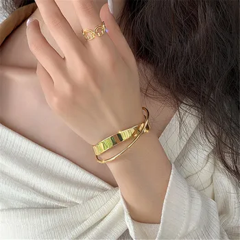 Sydkoreas nye skinnende dobbelt-lag geometriske uregelmæssige tværs polering dame armbånd smykker Metal retro kvinders armbånd